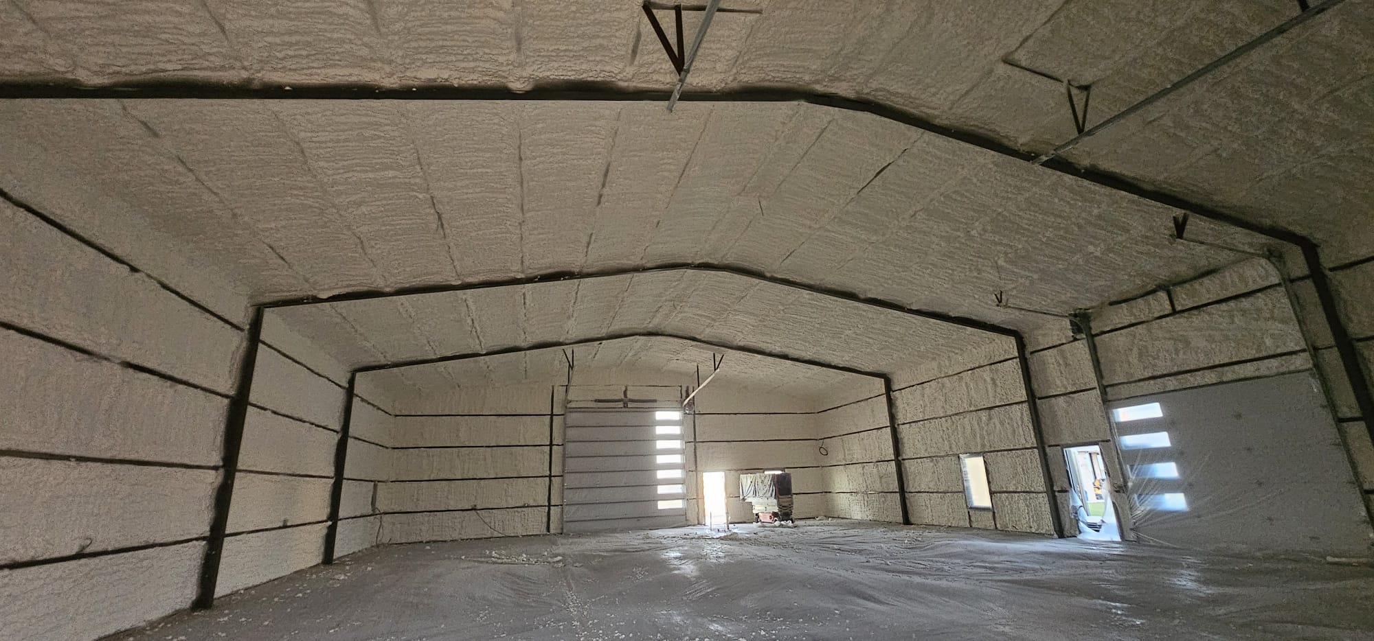 Closed-cell spray foam application on a metal building — Desert Spray Foaming