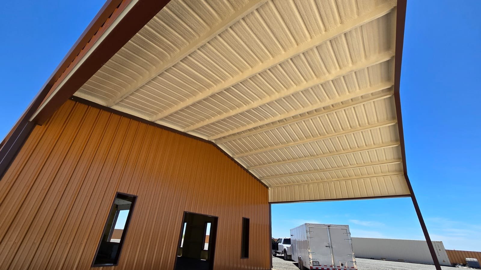 Closed-cell spray foam application on a metal building — Desert Spray Foaming