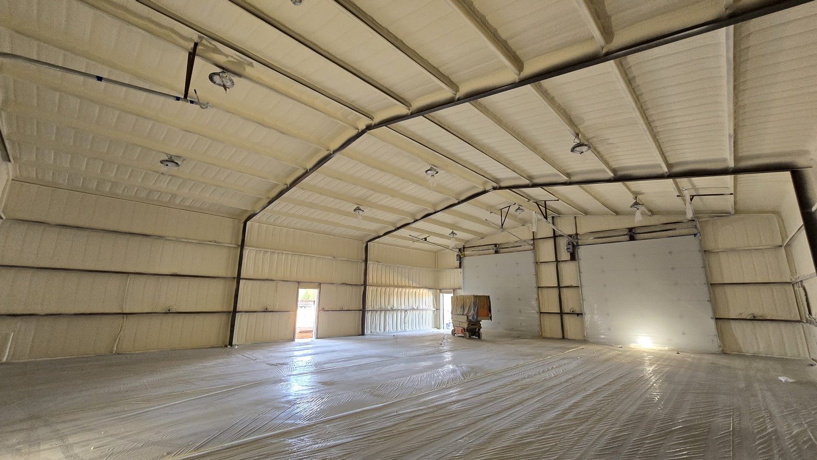 Pole barn spray foam insulation in progress — Desert Spray Foaming