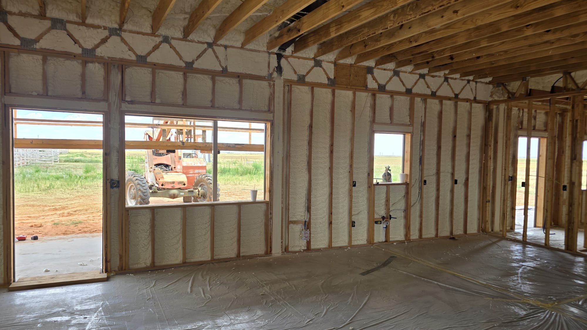 Closed-cell spray foam application on a metal building — Desert Spray Foaming