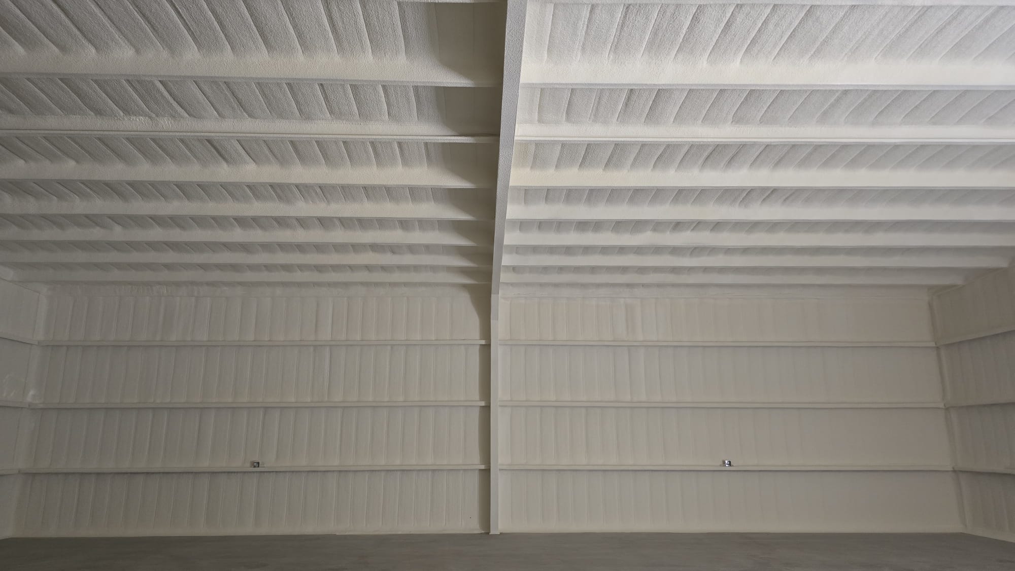 Metal building interior after spray foam insulation — Desert Spray Foaming