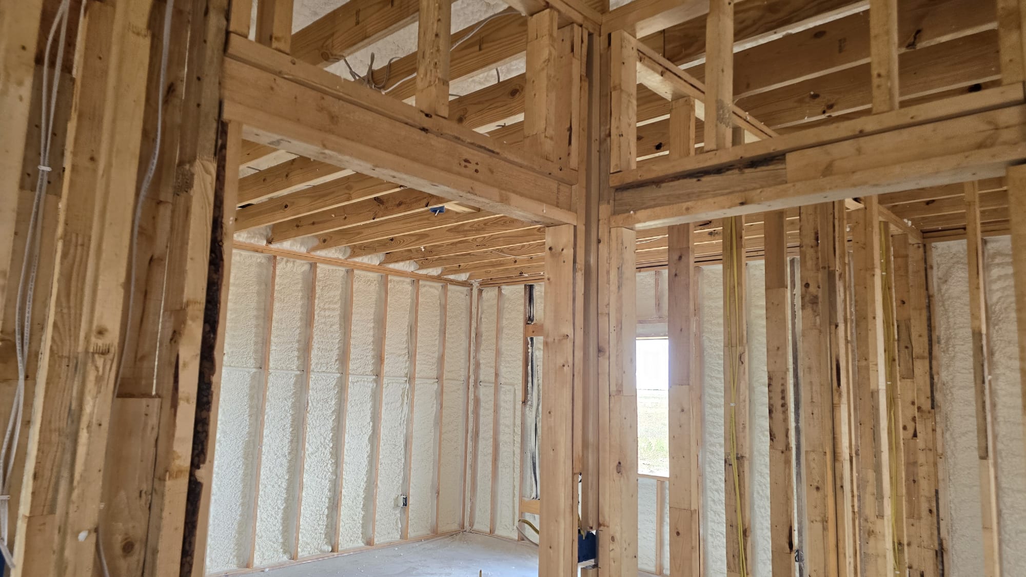 Closed-cell spray foam application on a metal building — Desert Spray Foaming