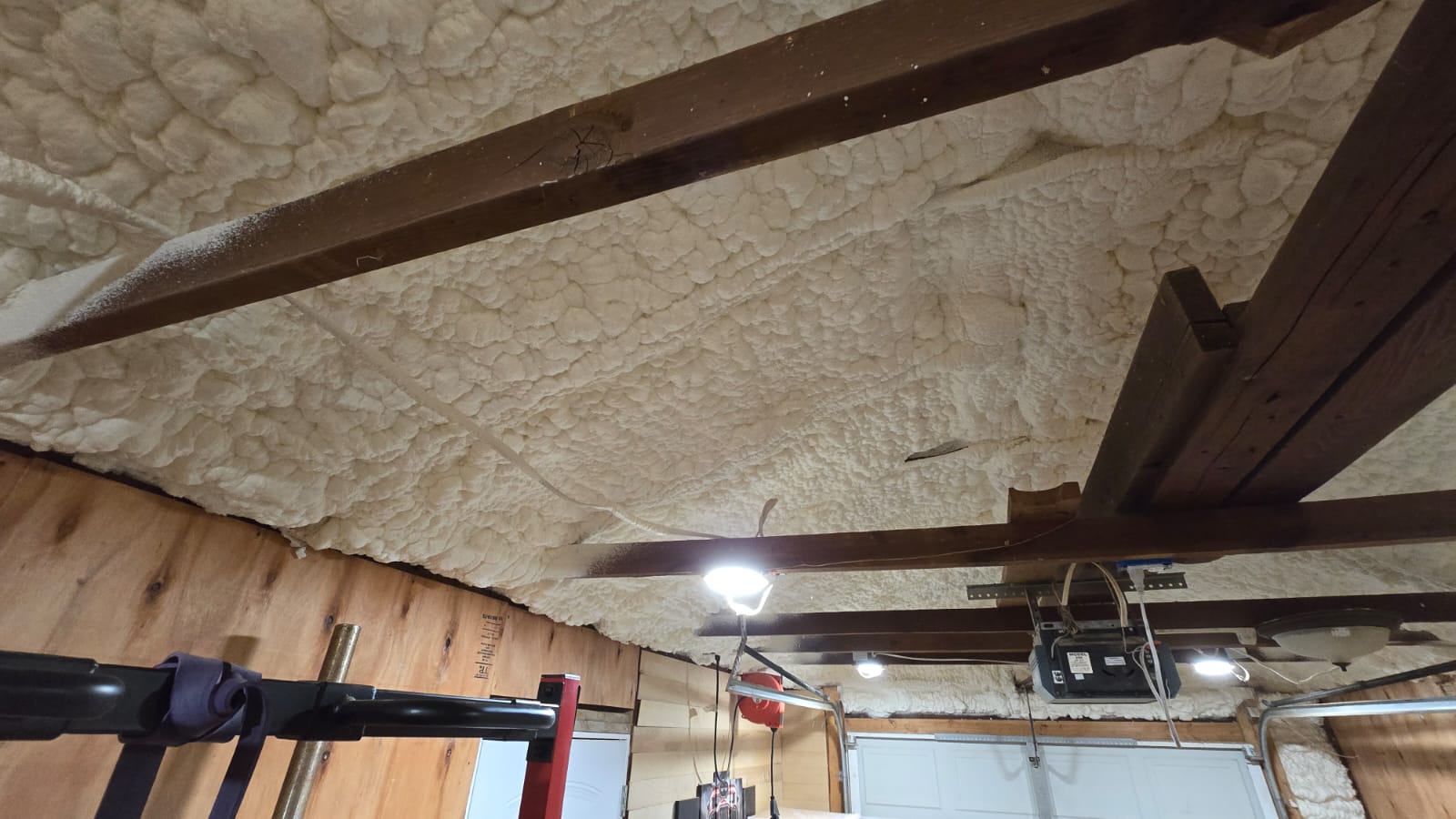 Spray foam insulation being applied to wall cavities — Desert Spray Foaming