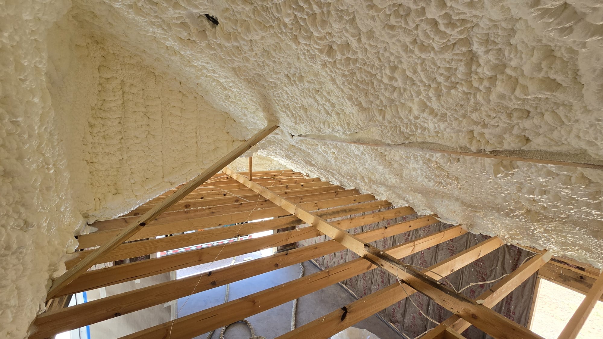 Closed-cell spray foam application on a metal building — Desert Spray Foaming